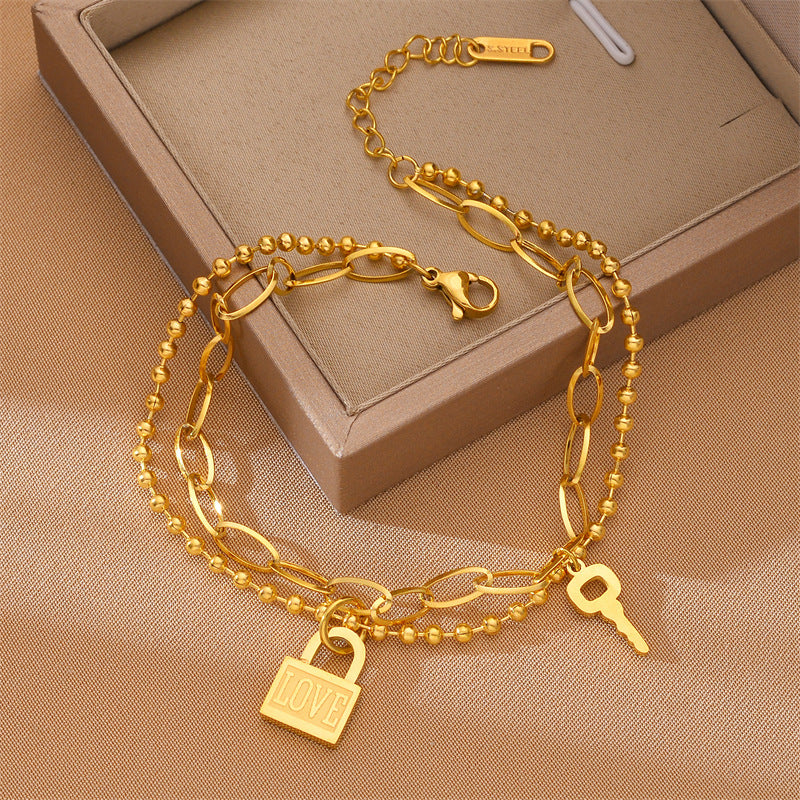 Gold Love Lock & Key Charm Bracelet