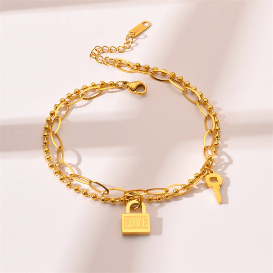 Gold Love Lock & Key Charm Bracelet