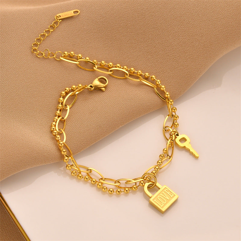 Gold Love Lock & Key Charm Bracelet